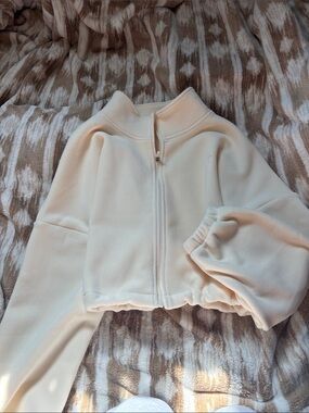 ZYIA Cream Pullover with Branded Care Tag